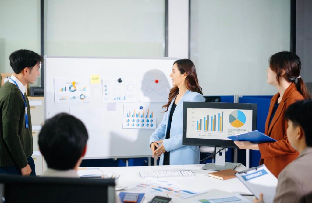Here are a few caption options tailored for this corporate meeting and strategy-focused image, perfect for LinkedIn, a business blog, or a professional social media update: